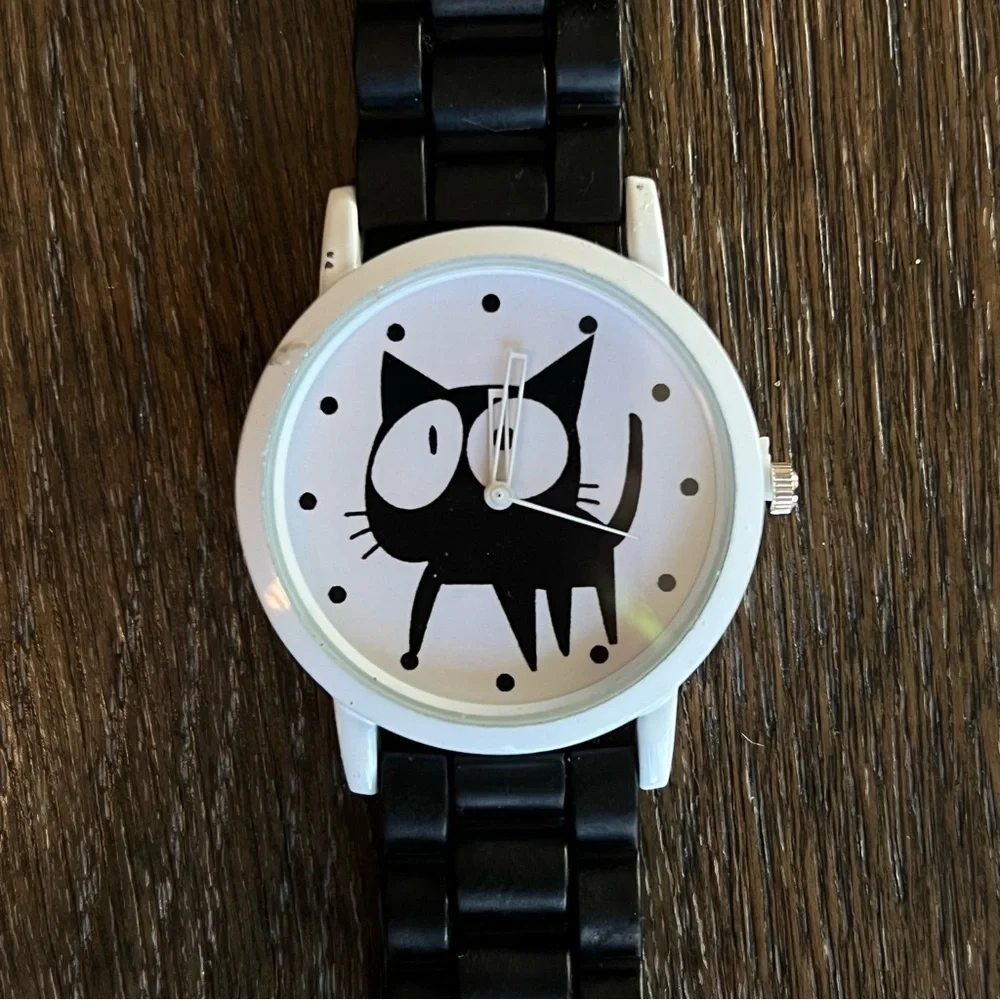 Cat watch, rubber black watch band. Gently used